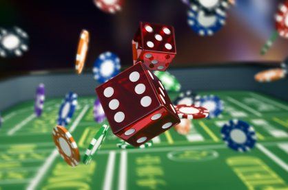 Chips and dice on a craps table background